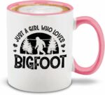 shop4ever Just a Girl who Loves Bigfoot Ceramic Coffee Mug Tea Cup. Funny Sasquatch Gift for Her 11 oz. (Pink Handle)