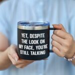 FALJIOK Yet Despite the Look on My Face You Are Still Talking Tumbler 14oz, Funny Coffee Mug Gifts for Coworkers, Novelty Mug for Work Office, Birthday Christmas Mug Gifts for...
