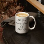 “I Need Coffee” Coffee Mug; Cool 15 oz White Ceramic Cup with a Funny Slogan; Great Unique Birthday or Novelty Gift